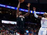 The Houston Rockets battled valiantly against the Thunder, showcasing young talent despite key injuries, ultimately losing 137-128. Image courtesy (cdn.vox-cdn.com)