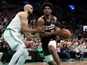 The thrilling NBA matchup between the Portland Trail Blazers and the Boston Celtics showcased intense competition, star players, and a nail-biting finish, highlighting the evolving dynamics of professional basketball. Image courtesy (cdn.vox-cdn.com)