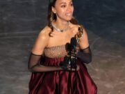 Zoe Saldana Breaking Barriers At Oscar held On March 2, 2025 : Wins First Oscar For the Best Supporting actress Paving the Way in Hollywood. Explore Zoe Saldana's remarkable journey as a trailblazer in Hollywood and her impact on film and representation. Image courtesy (assets1.cbsnewsstatic.com)