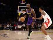 Gabe Vincent shines in the recent Lakers vs. Rockets game, showcasing his potential as a key player for LA amidst the battle for playoff positioning in the Western Conference (s.yimg.com).