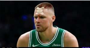 Explore Kristaps Porziņģis's resilience after his injury during playoff game against the Magic, showcasing his strength and determination. Image courtesy (jb-optimus.s3.ap-south-1.amazonaws.com)